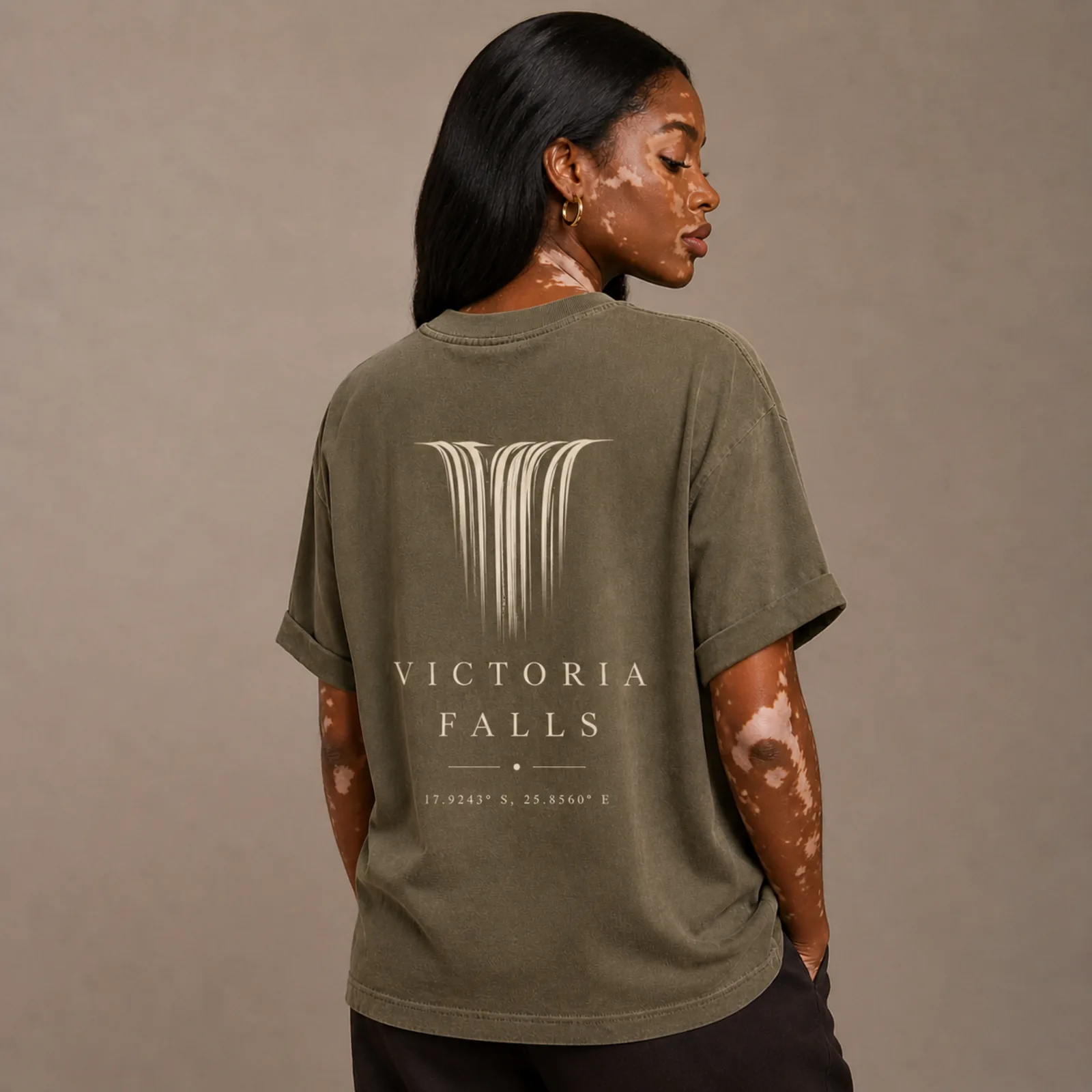 Model wearing Stone Olive Victoria Falls tee